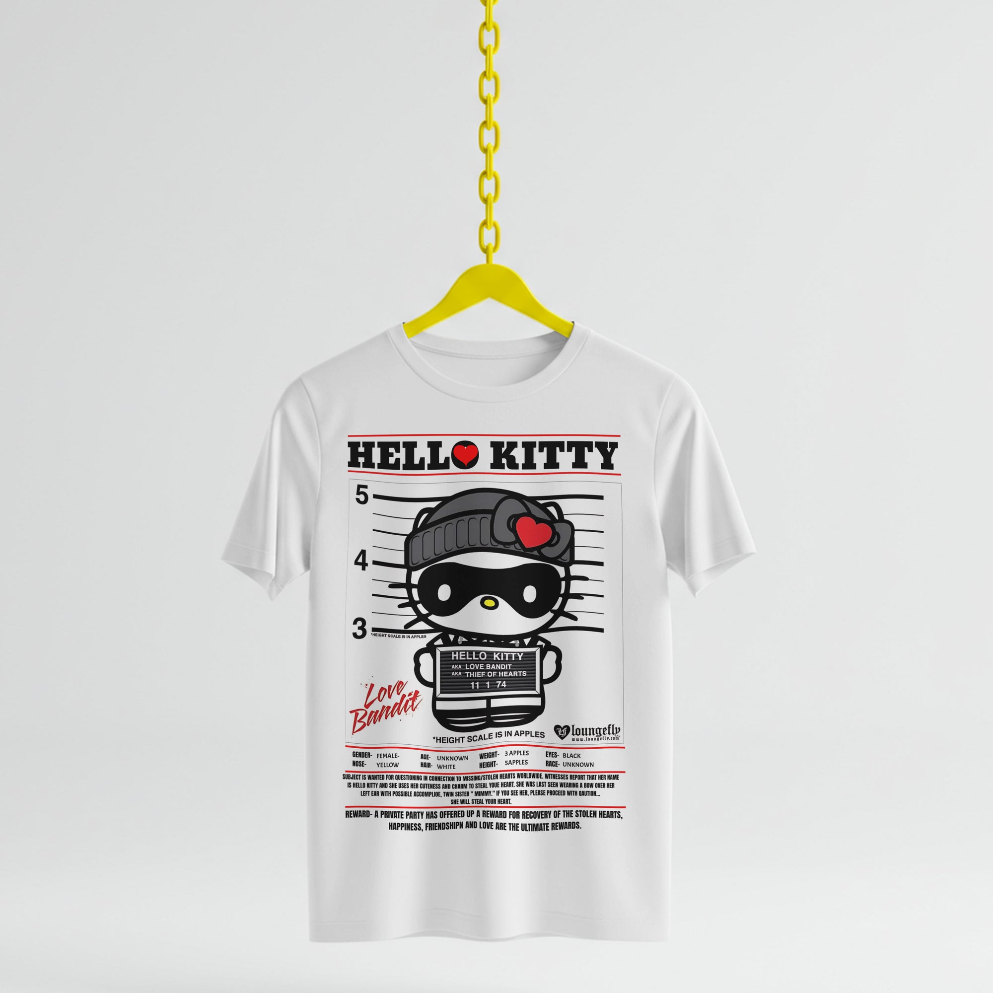 White t-shirt with Hello Kitty graphic design on a yellow hanger against a white background