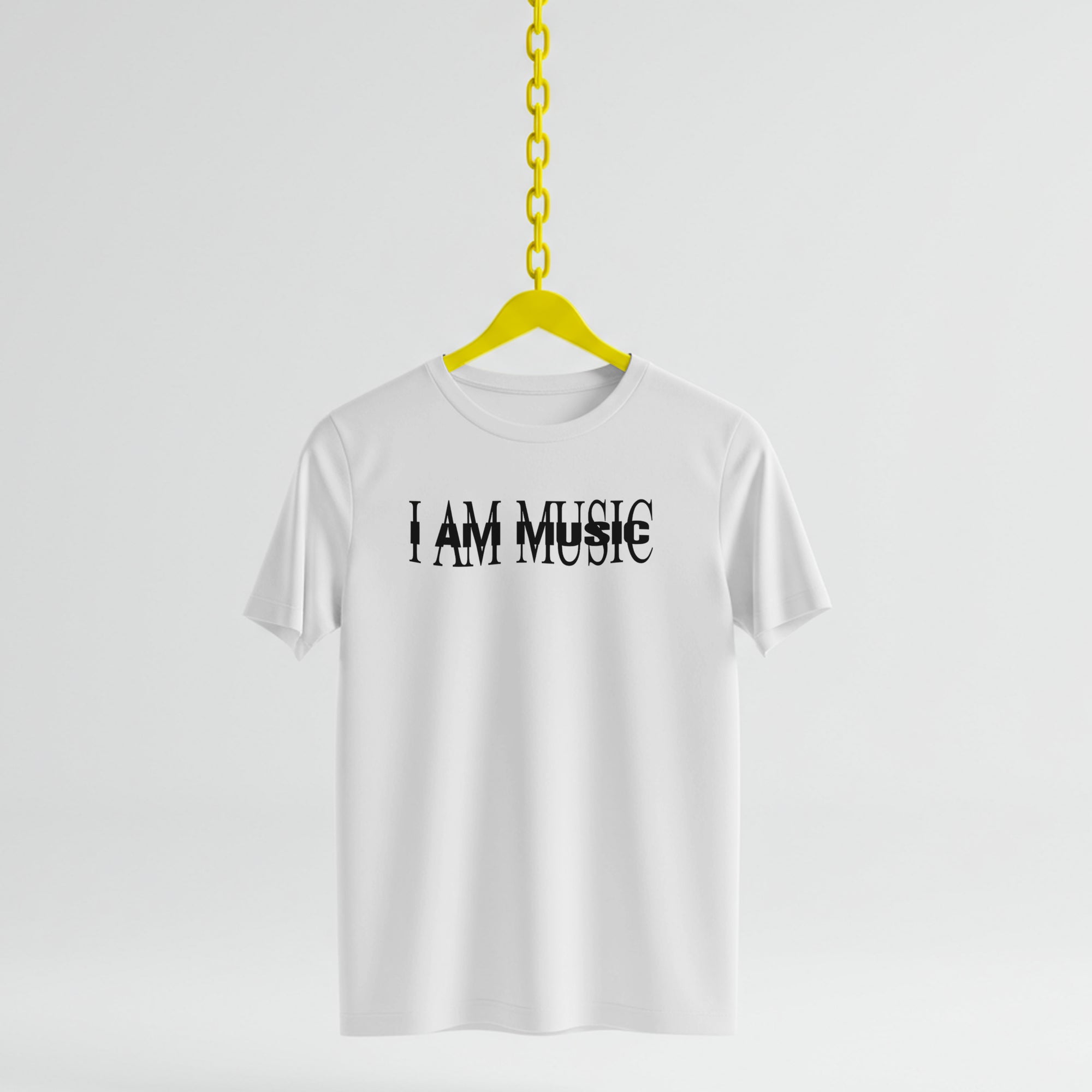 White t-shirt with 'I AM MUSIC' text on a yellow hanger against a white background