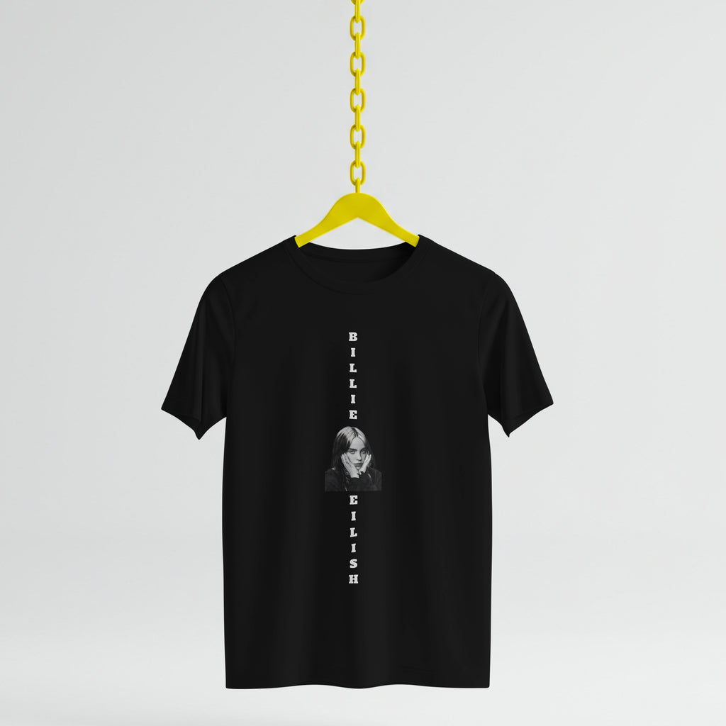 Black t-shirt with a graphic of a person and text on a yellow hanger against a light gray background