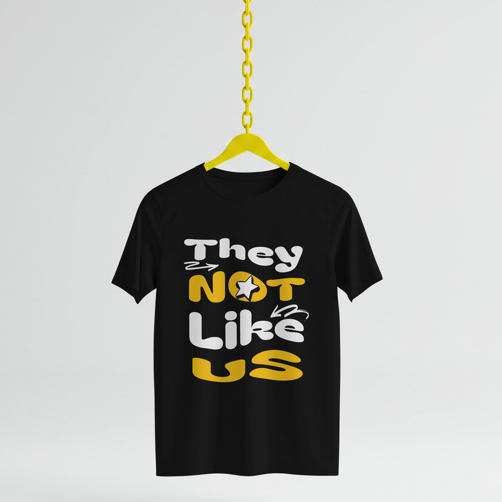 Black t-shirt with colorful text on a yellow hanger against a light gray background
